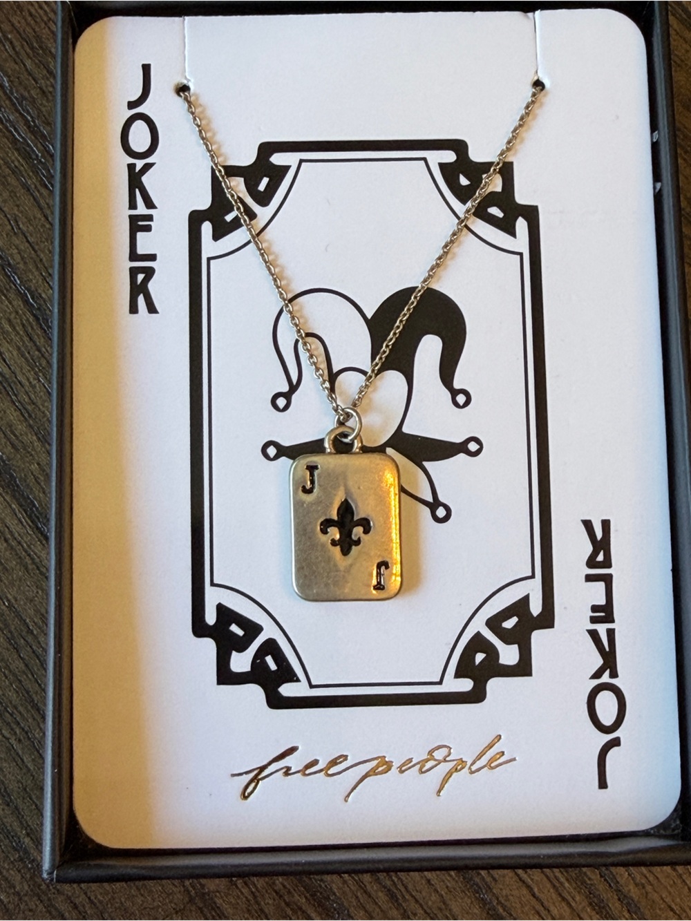 Free People Silver Fleur-de-Lis Joker Card Pendant Necklace